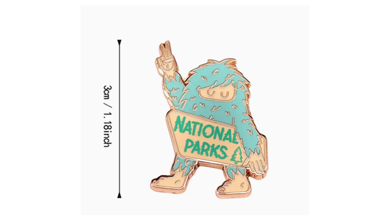 Gold and Teal Sasquatch Enamel Pin